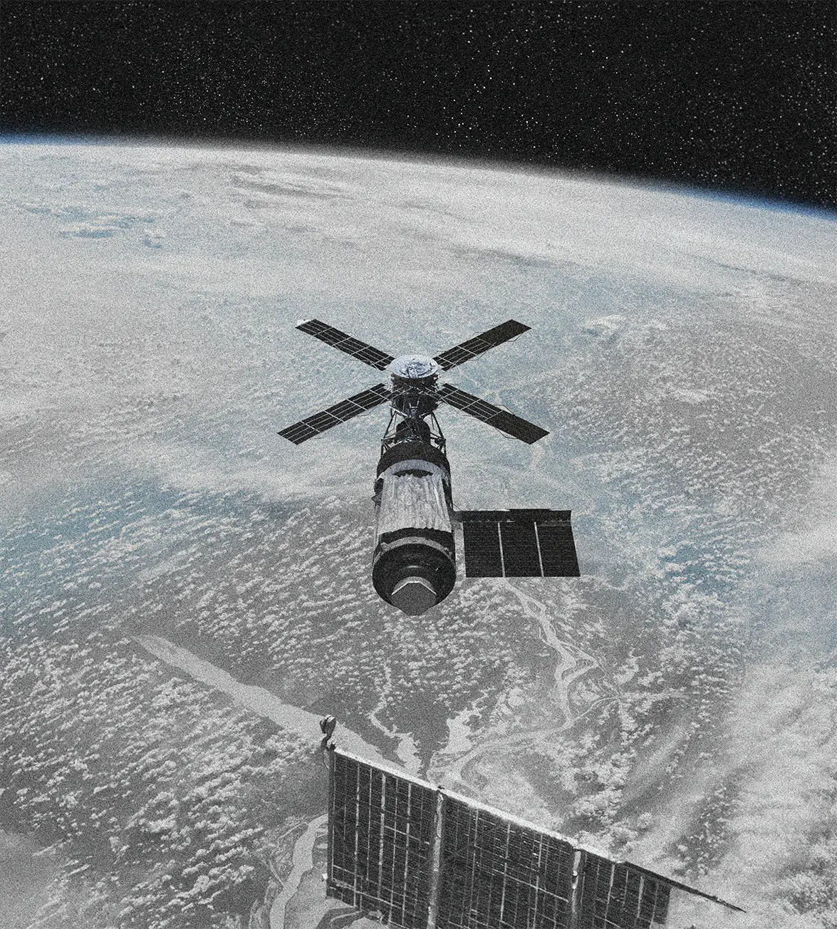 A image of a concrete sphere, balanced between two other larger spheres